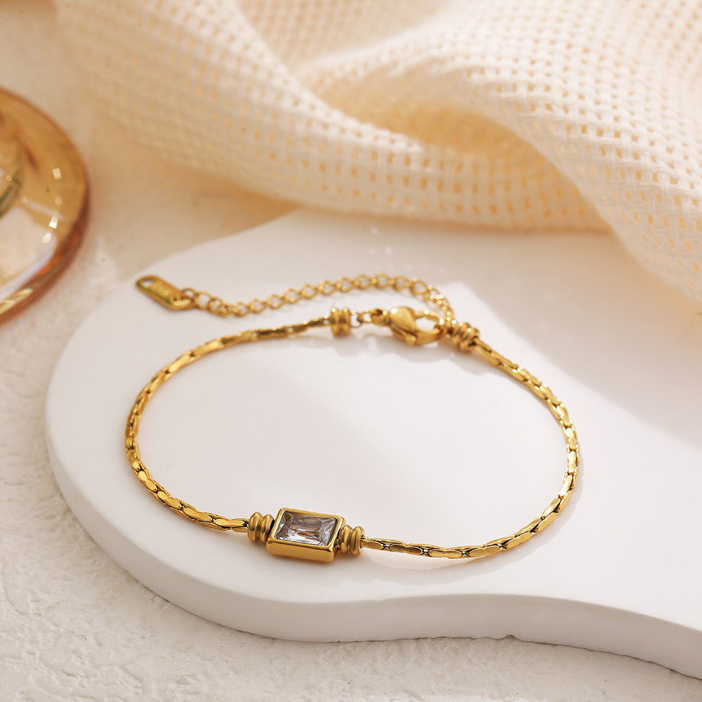 Titanium Steel Rope-knot Braided Chain Bracelet With Clear Cubic Zirconia Available In 18K Gold And Silver Finishes